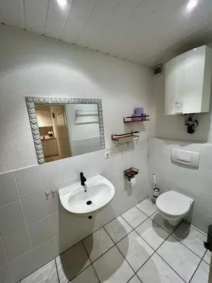 Ein Badezimmer in der Unterkunft Moderne Souterrainwohnung
