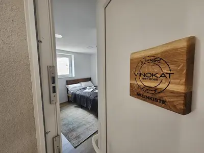 Ein Bett oder Betten in einem Zimmer der Unterkunft Weinkiste - VINoKAT Living
