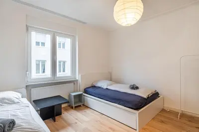 Ein Bett oder Betten in einem Zimmer der Unterkunft Am Pfälzerplatz - 3 Zimmer und 6 Betten