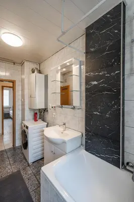 Ein Badezimmer in der Unterkunft Am Pfälzerplatz - 3 Zimmer und 6 Betten