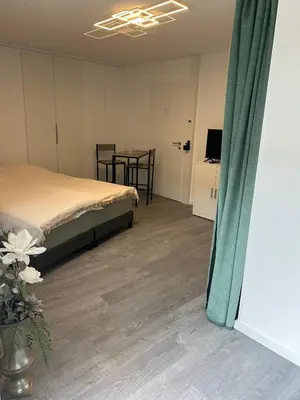Ein Bett oder Betten in einem Zimmer der Unterkunft Apartment Hélène mit Doppel- oder 2 Einzelbetten für 2 Personen mit eigenem Eingang -Neubau-