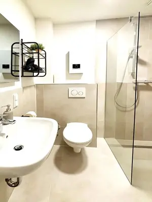 Ein Badezimmer in der Unterkunft COZEE - Air-Conditioned Apartment with Netflix