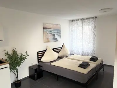 Ein Bett oder Betten in einem Zimmer der Unterkunft Appartement Waldruhe