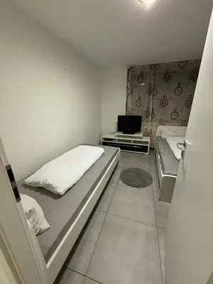 Ein Bett oder Betten in einem Zimmer der Unterkunft Kilicer Apartments
