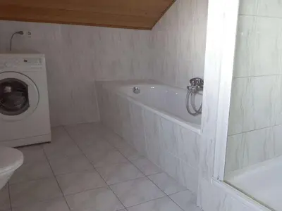Ein Badezimmer in der Unterkunft Guesthouse König