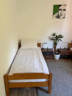 Ein Bett oder Betten in einem Zimmer der Unterkunft 3 Room Apartment