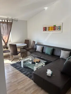 Ein Sitzbereich in der Unterkunft 3 Room Apartment