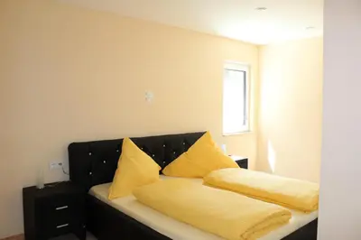 Ein Bett oder Betten in einem Zimmer der Unterkunft Deluxe Apartment nearby Heidelberg