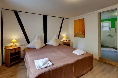 Ein Bett oder Betten in einem Zimmer der Unterkunft Hotel Kleine Radlerherberge