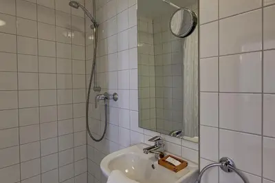 Ein Badezimmer in der Unterkunft Hotel Kleine Radlerherberge