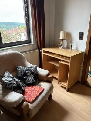 Ein Sitzbereich in der Unterkunft Ferienwohnung Jägerhaus