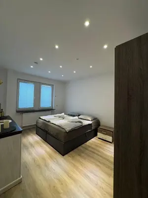 Ein Bett oder Betten in einem Zimmer der Unterkunft Sunshine
