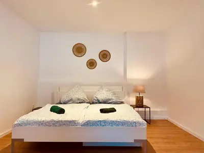 Ein Bett oder Betten in einem Zimmer der Unterkunft Odw homes - Large apartment with four bedrooms