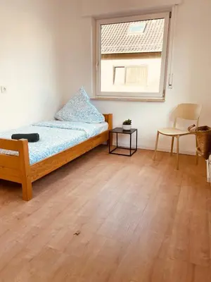Ein Bett oder Betten in einem Zimmer der Unterkunft Odw homes - Large apartment with four bedrooms