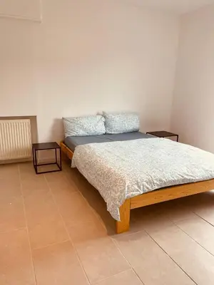 Ein Bett oder Betten in einem Zimmer der Unterkunft Odw homes - Large apartment with four bedrooms
