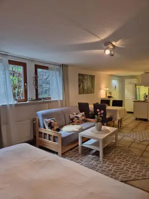 Ein Bett oder Betten in einem Zimmer der Unterkunft Ferienwohnung Waldnest