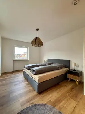 Ein Bett oder Betten in einem Zimmer der Unterkunft StayPfalz Apartment - 3 Zimmer & Parkplatz