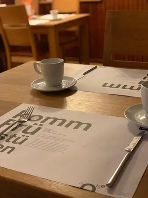 Ein Restaurant oder anderes Speiselokal in der Unterkunft Pension Pauserei