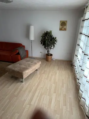 Ein Sitzbereich in der Unterkunft Klassisch Ruhig und Vertrauensvoll Zimmer