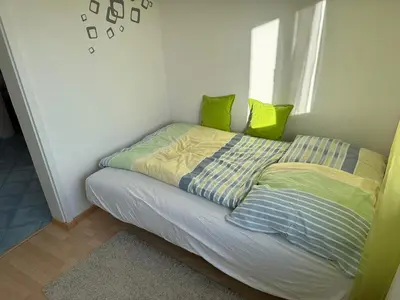 Ein Bett oder Betten in einem Zimmer der Unterkunft Klassisch Ruhig und Vertrauensvoll Zimmer