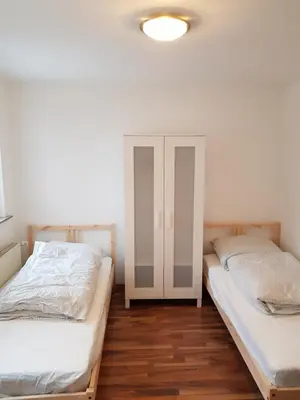 Ein Bett oder Betten in einem Zimmer der Unterkunft Augustenburgstr 34 Karlsruhe Whg 10