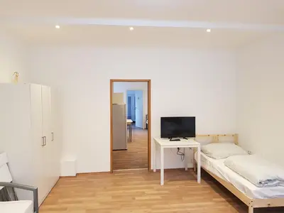 Ein Bett oder Betten in einem Zimmer der Unterkunft Augustenburgstr 34 Karlsruhe Whg 10