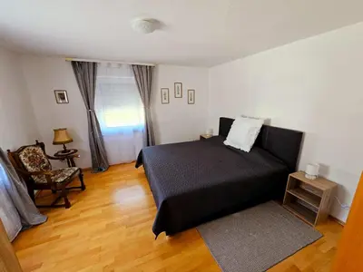 Ein Bett oder Betten in einem Zimmer der Unterkunft Ferienhaus-Drachenfels-Busenberg