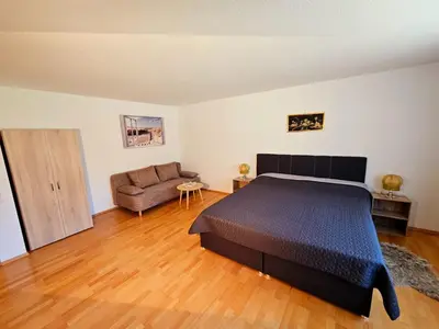 Ein Bett oder Betten in einem Zimmer der Unterkunft Ferienhaus-Drachenfels-Busenberg