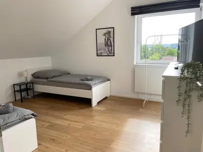 Ein Bett oder Betten in einem Zimmer der Unterkunft Moderne Unterkunft mit 5 Betten in Pfaffenhofen-Baden-Württemberg