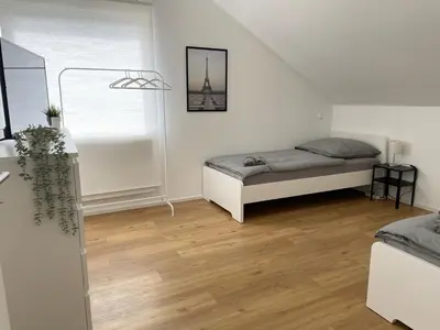 Ein Bett oder Betten in einem Zimmer der Unterkunft Moderne Unterkunft mit 5 Betten in Pfaffenhofen-Baden-Württemberg