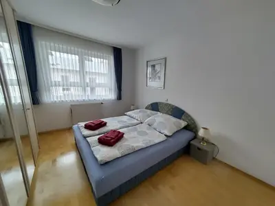 Ein Bett oder Betten in einem Zimmer der Unterkunft Ferienwohnung Karlsruhe