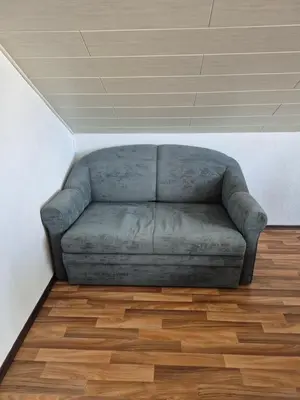 Ein Sitzbereich in der Unterkunft Unterkunft Julian