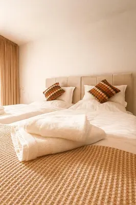 Ein Bett oder Betten in einem Zimmer der Unterkunft E&E Appartement