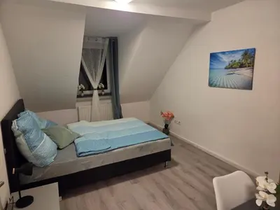 Ein Bett oder Betten in einem Zimmer der Unterkunft Wohlfühl-Insel 2