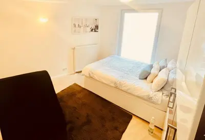 Ein Bett oder Betten in einem Zimmer der Unterkunft Cityresidenz Karlsruhe