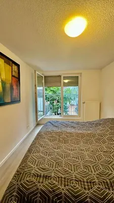 Ein Bett oder Betten in einem Zimmer der Unterkunft Cityresidenz Karlsruhe