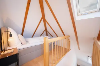 Ein Bett oder Betten in einem Zimmer der Unterkunft BackHome - MAISIONETTE - 120qm - Fantastische Schlosslage - SmartTV - Waschmaschine - Netflix - 24h Checkin- Apartment 4