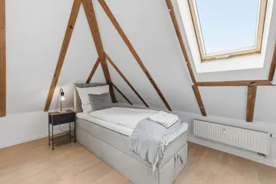 Ein Bett oder Betten in einem Zimmer der Unterkunft BackHome - MAISIONETTE - 120qm - Fantastische Schlosslage - SmartTV - Waschmaschine - Netflix - 24h Checkin- Apartment 4