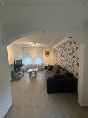 Ein Sitzbereich in der Unterkunft Shekinah Residences near Frankfurt Airport