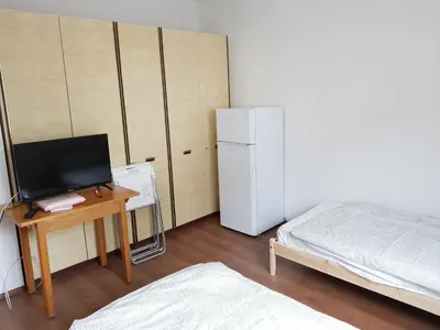 Ein Bett oder Betten in einem Zimmer der Unterkunft Siedlungsstr 19 Bruchsal Whg 10