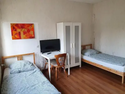 Ein Bett oder Betten in einem Zimmer der Unterkunft Siedlungsstr 19 Bruchsal Ap 40