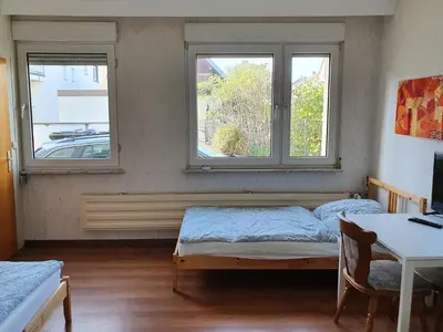 Ein Bett oder Betten in einem Zimmer der Unterkunft Siedlungsstr 19 Bruchsal Ap 40