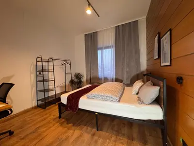 Ein Bett oder Betten in einem Zimmer der Unterkunft Apartment nahe Frankfurt am Main mit Parkplätzen PKW oder VAN