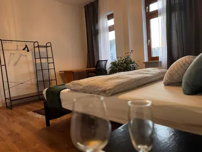 Ein Bett oder Betten in einem Zimmer der Unterkunft Apartment nahe Frankfurt am Main mit Parkplätzen PKW oder VAN