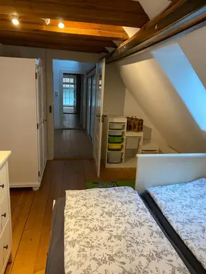 Ein Bett oder Betten in einem Zimmer der Unterkunft Frihmess
