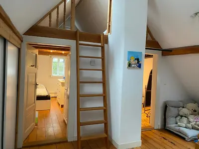 Ein Bett oder Betten in einem Zimmer der Unterkunft Frihmess