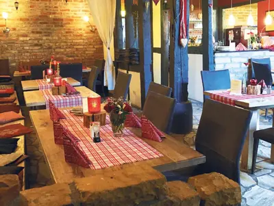 Ein Restaurant oder anderes Speiselokal in der Unterkunft Hofschänke