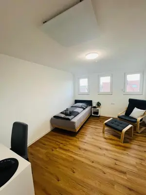 Ein Bett oder Betten in einem Zimmer der Unterkunft Schönblick modernes Gästehaus mit Panoramablick