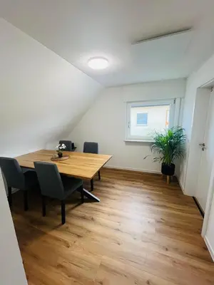 Der Geschäftsbereich oder Konferenzraum in der Unterkunft Schönblick modernes Gästehaus mit Panoramablick