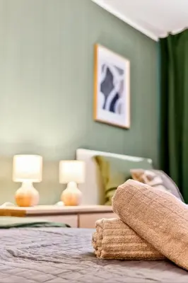 Ein Bett oder Betten in einem Zimmer der Unterkunft NEW Apartment Tina- 2-Zimmer, 4 Einzelbetten, Parkplatz
